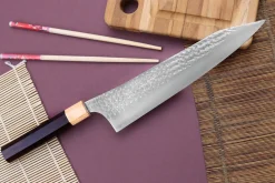 Couteau de chef kiritsuke japonais artisanal martelé Yu Kurosaki senko 24cm acier SG2