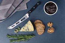 Couteau à fromage Tramontina Century lame ajourée 15cm manche polycarbonate noir