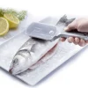 Ecailleur professionnel avec couvercle "Scalex" Westmark en aluminium et acier inox
