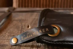 Manique Alaskan Maker Defender noir et orange en cuir