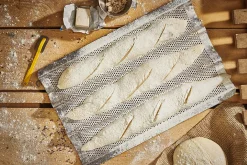 Plaque de cuisson De Buyer perforée en inox pour 3 baguettes