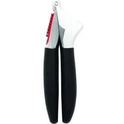 Presse-ail OXO avec brosse à picots intégrée