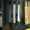 Set de 2 pinces Joseph Joseph Elevate Fusion en silicone avec reposoir intégré